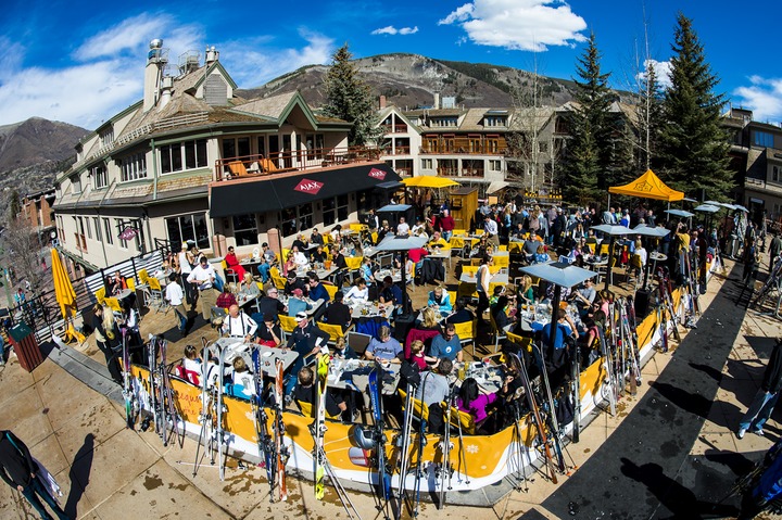 Guests enjoying après ski drinks at the Ajax Tavern in Aspen.