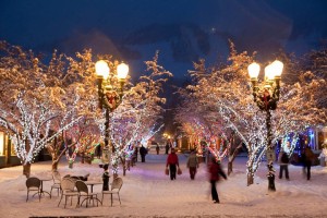 People out shopping on the snow-covered streets of Aspen in the winter.