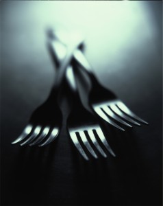 Three forks on display to represent dining at the Limelight Hotel Aspen.