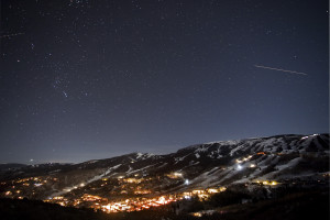 A starlit sky featuring a shooting star over a relaxing night in Aspen