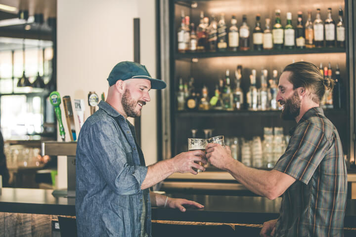 Two friends drinking aprés beers in Ketchum, Idaho.