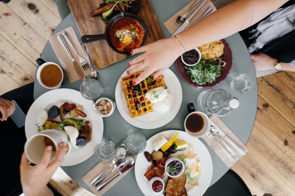 An overhead view of a full table of breakfast food in Sun Valley, Idaho.