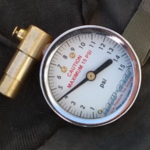 A tire pressure gauge which shows the PSI of a tire, which is important for winter biking.