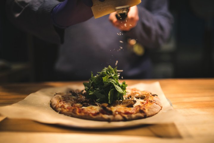A wood-fired pizza being prepared for après ski at the Limelight Lounge.